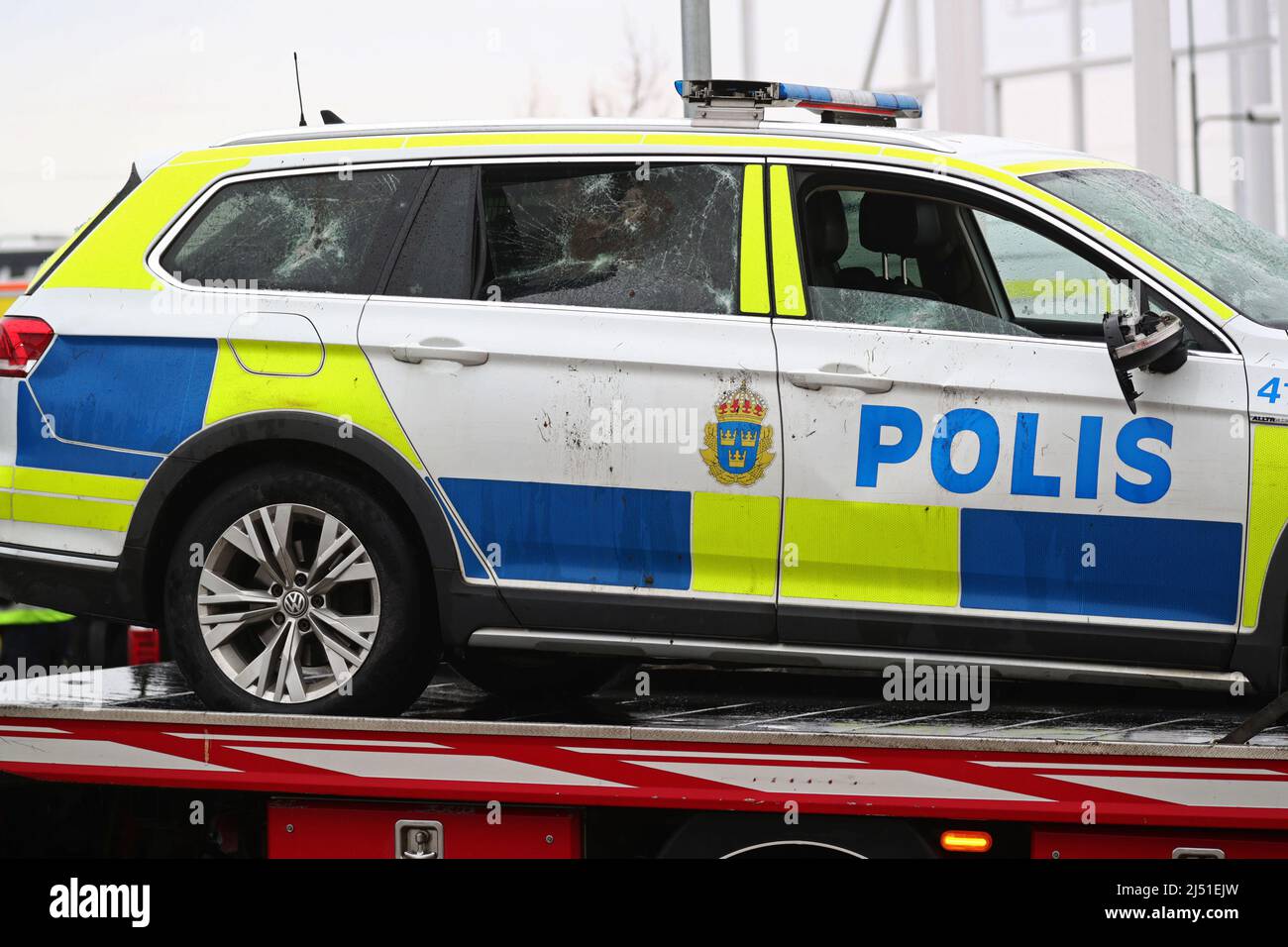 Three policemen were taken to hospital and two people have been arrested in connection with a violent riot in the Linköping district Skäggetorp, where the right-wing extremist Stram kurs (In english: Stram course) had planned a demonstration. The picture shows police cars that were destroyed during the incident. Stock Photo