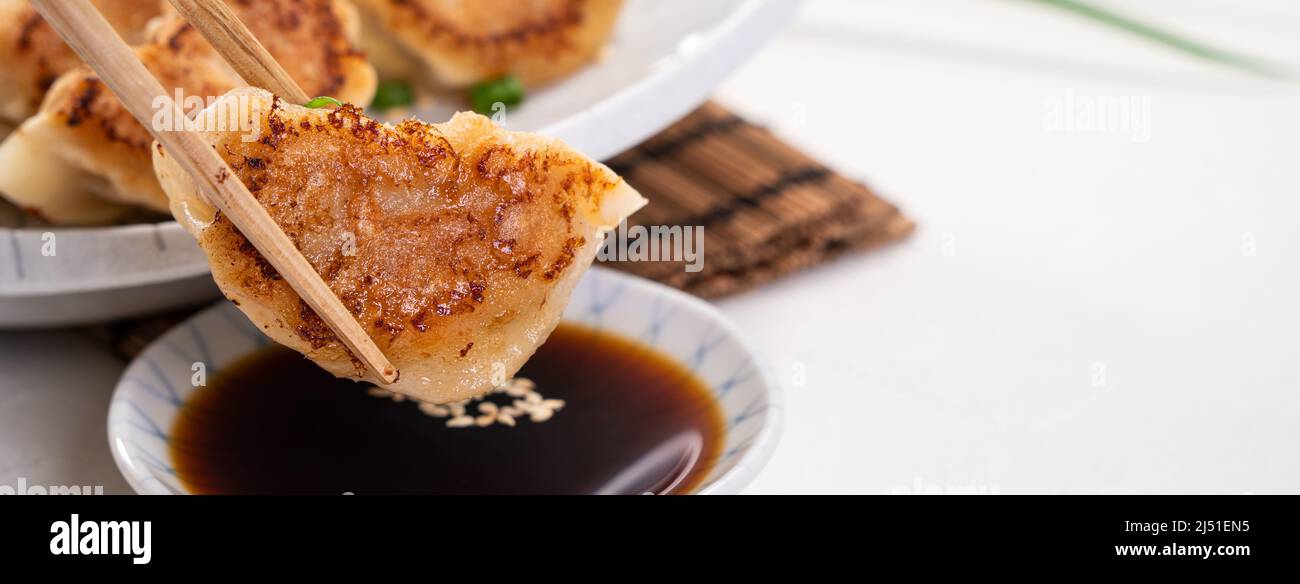 Taiwanese and Japanese Panfried gyoza dumpling jiaozi food in a plate