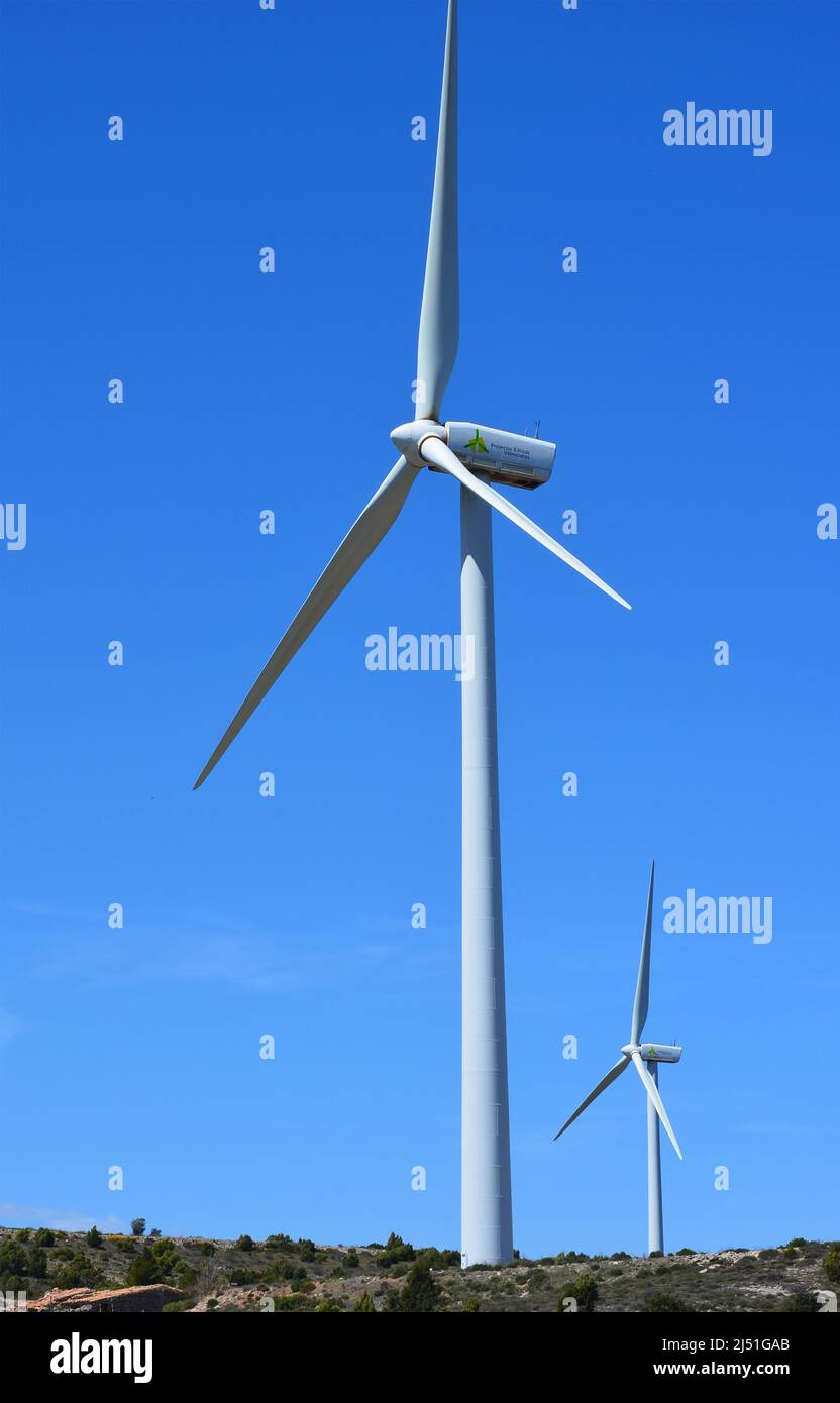 Massive wind turbine towers in a mountainous area of Valencia region, eastern Spain Stock Photo