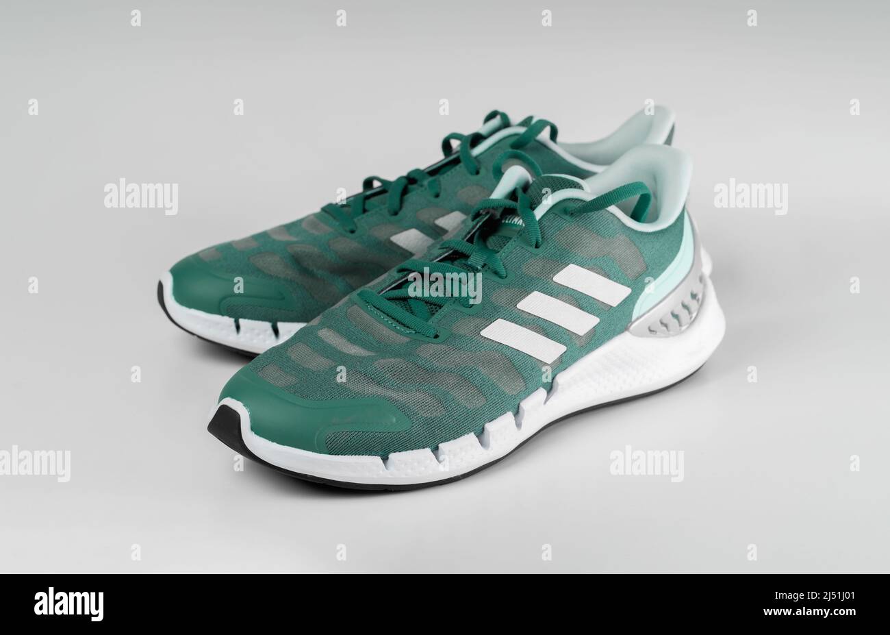 LONDON, UK - APRIL 19, 2022: Adidas Sport Running shoe. Fashionable stylish  sports casual shoes. Trendy sport footwear. Fashionable pair of green snea  Stock Photo - Alamy