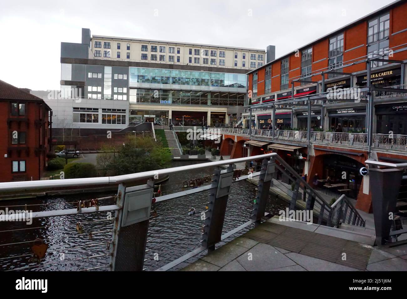 The love lock bridge and canal at the Mail Box, Birmingham, United Kingdom Stock Photo