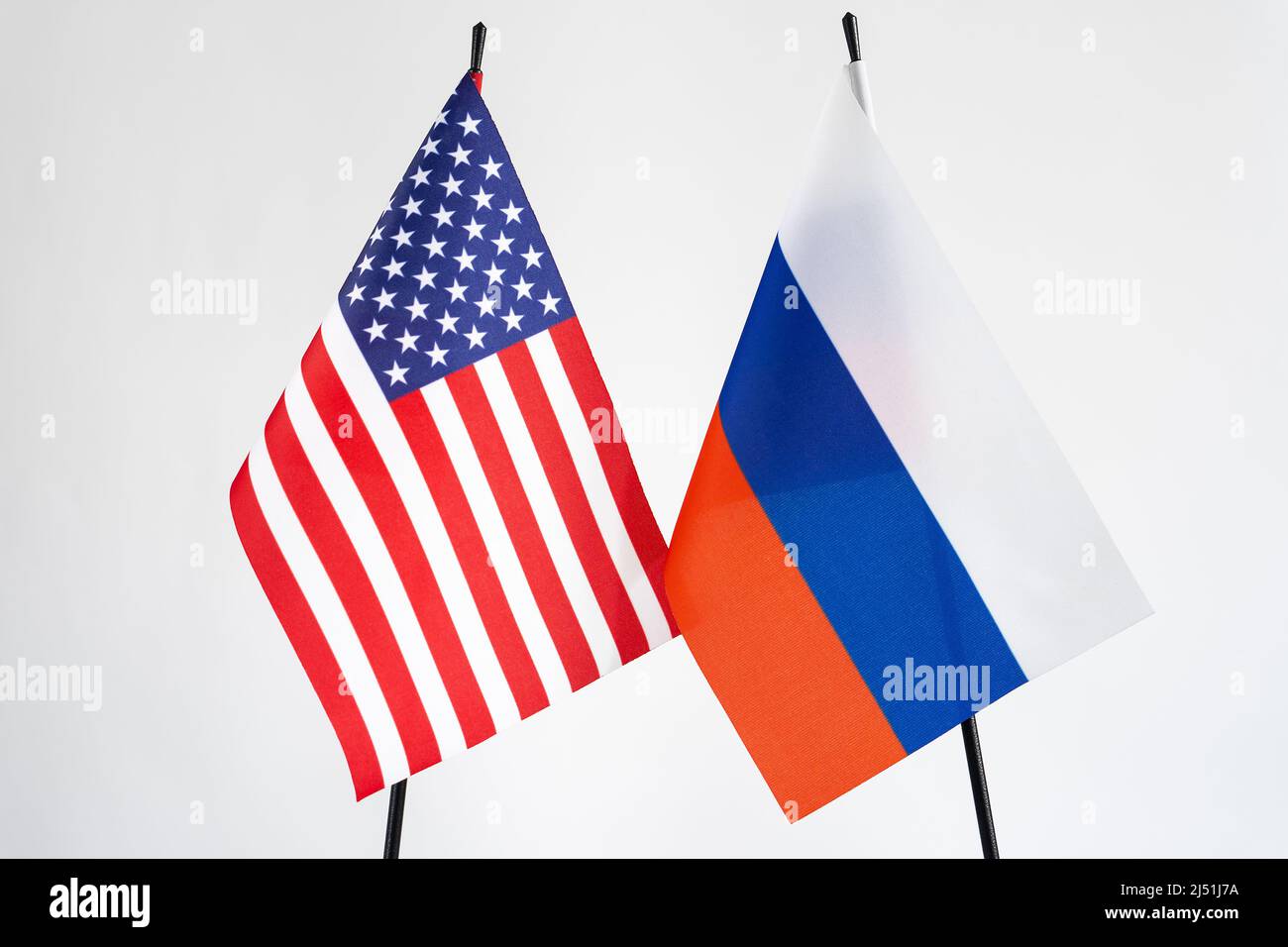 Russian Federation and United States of America flag on white background. Sanctions conflict concept Stock Photo