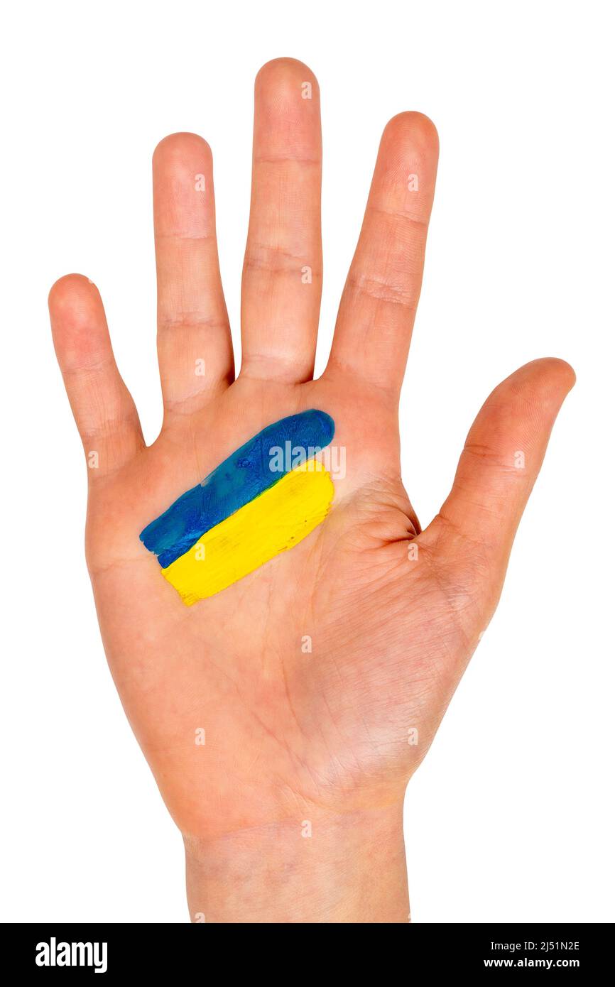 Child hand with a painted flag of Ukraine. Stop War. Peace in Ukraine. Isolated. Stock Photo