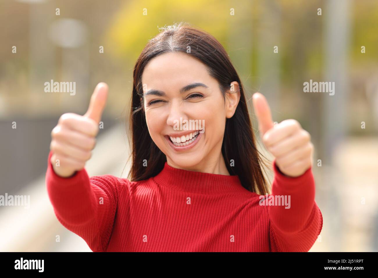 Woman very happy thumbs up hi-res stock photography and images - Alamy