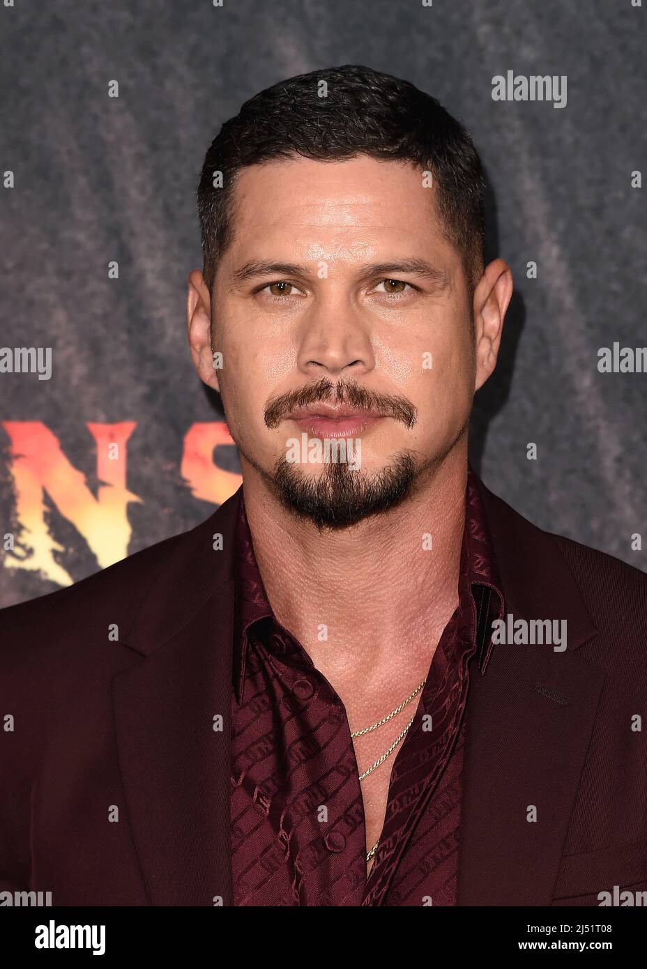 JD Pardo walking on the red carpet at FX's "Mayans M.C." season 4