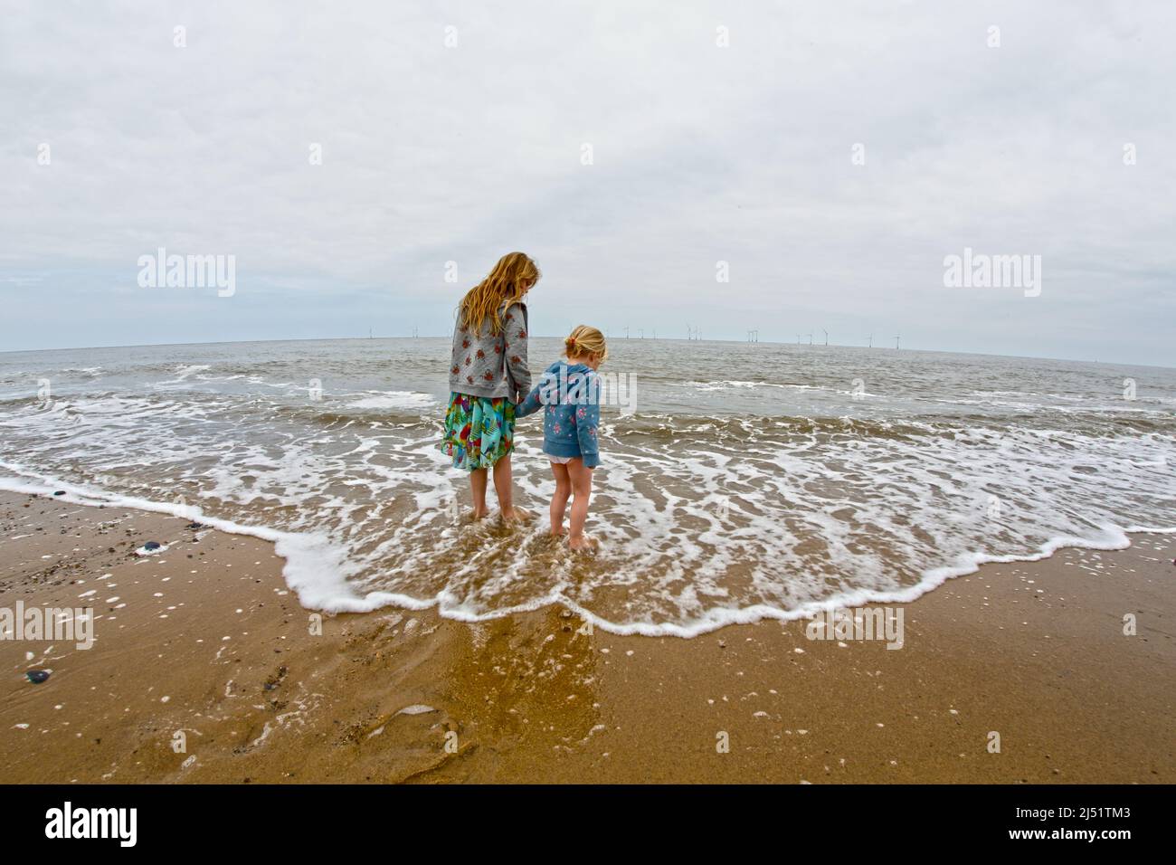 First steps in the sea. Stock Photo
