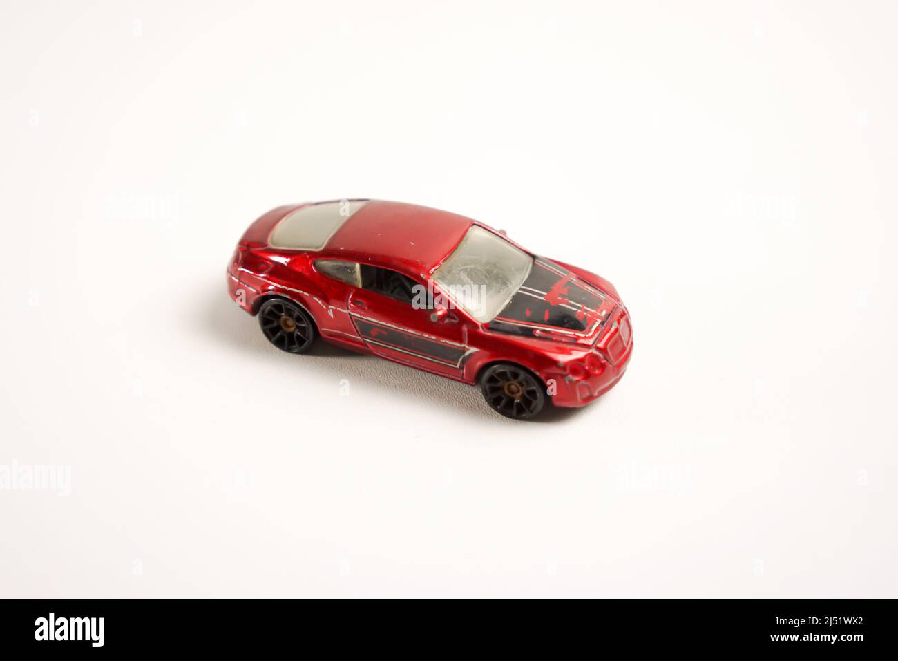 Red color Hot Wheels car toys on white background Stock Photo Alamy
