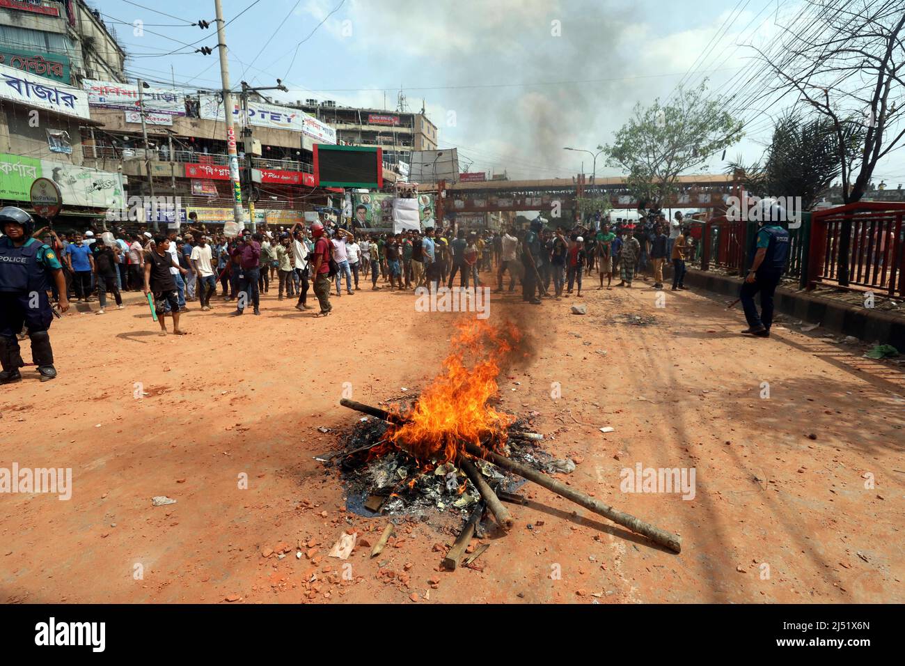 Police gather use tear gas shells to disperse students from Dhaka college after they clashed with the New Market traders in Dhaka on April 19, 2022. Photo by Habibur Rahman/ABACAPRESS.COM Credit: Abaca Press/Alamy Live News Stock Photo