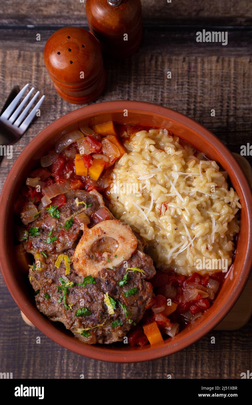 Ossobuco. Veal (beef) shanks with saffron risotto in milanese