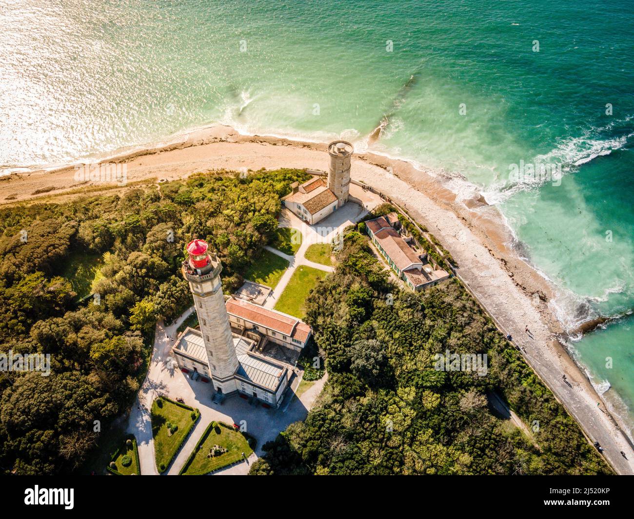 Aerial drone shot of the Phare des Baleines or Lighthouse of the Whales at sunset and sea view on Ile de Ré or island of Re in France Stock Photo