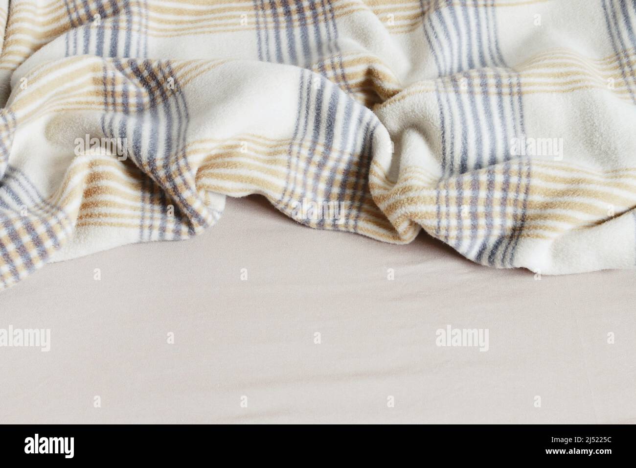 Beige blanket and bedsheet. Graphic resources Stock Photo Alamy