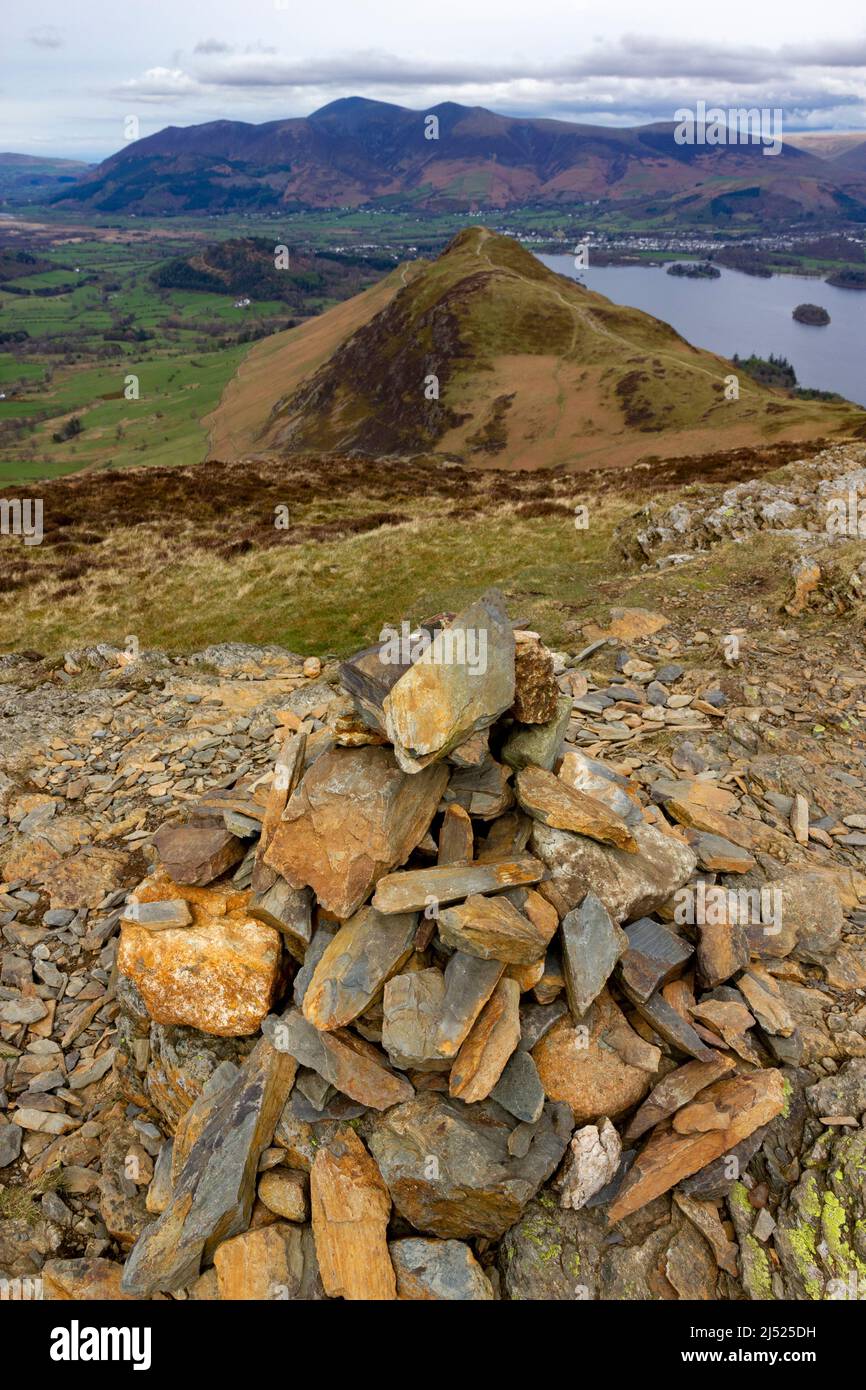 cairn on Maiden Moor overlooking Derwent Water and Cat Bells Lake District Cumbria Stock Photo