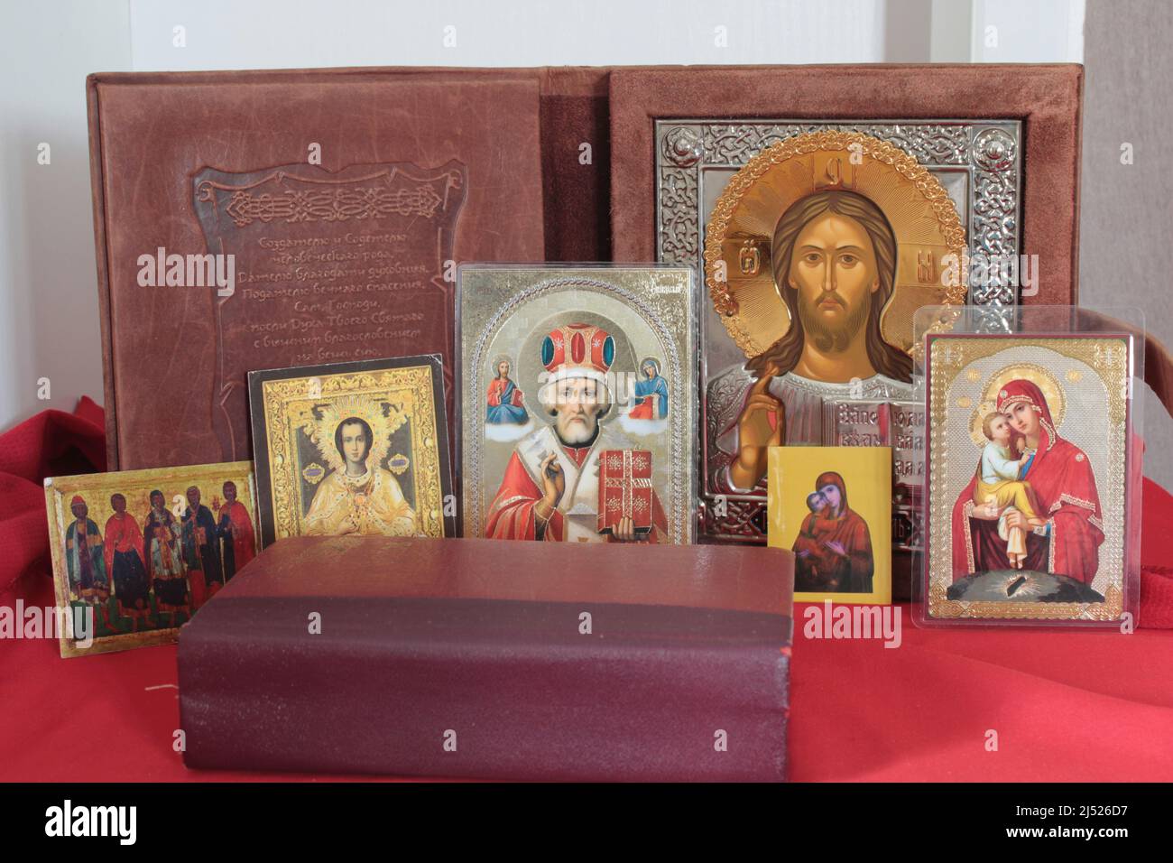 Ukrainian Orthodox religious pictures on a UK bedside table depicting Jesus Christ, Virgin Mary, Saint Pantaleon and the five holy martyrs Lancashire, Stock Photo