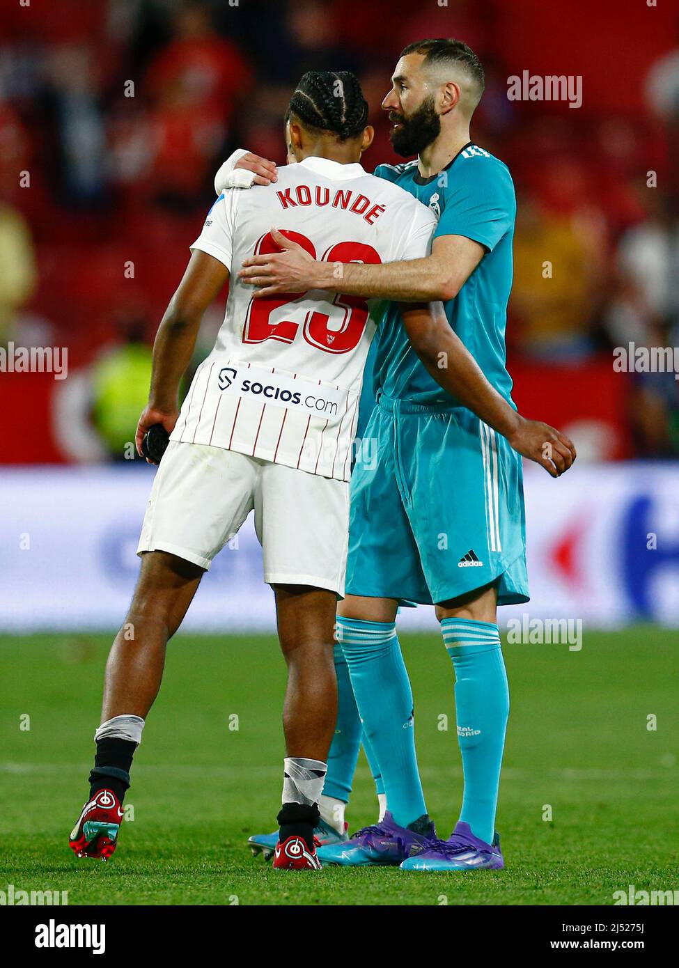 Karim Benzema of Real Madrid and Jules Kounde of Sevilla FC during the La  Liga match between Sevilla FC and Real Madrid played at Sanchez Pizjuan  Stadium on April 17, 2022 in