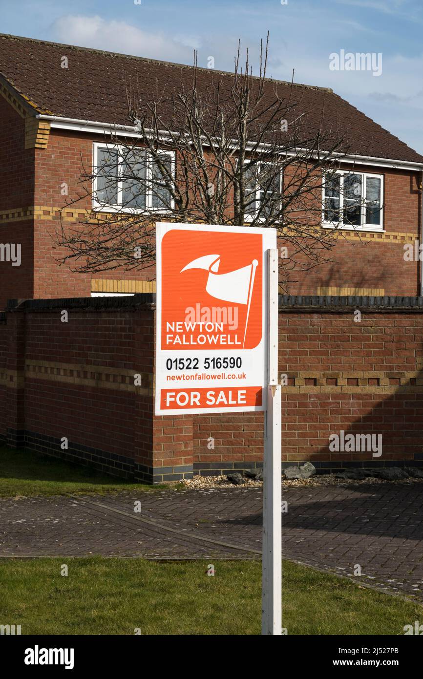 Estate agent sign property for sale Stock Photo