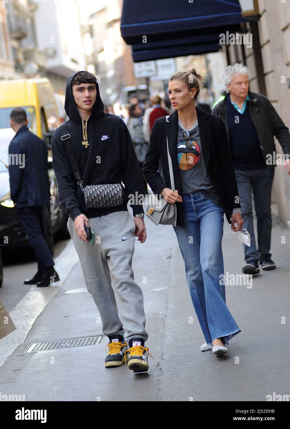 Milan, . 19th Apr, 2022. Milan, 19-04-2022 Martina Colombari, who is on the 'Montagne Russe' theater tour with Corrado Tedeschi, surprised walking through the streets of the center with her son ACHILLE Credit: Independent Photo Agency/Alamy Live News Stock Photo
