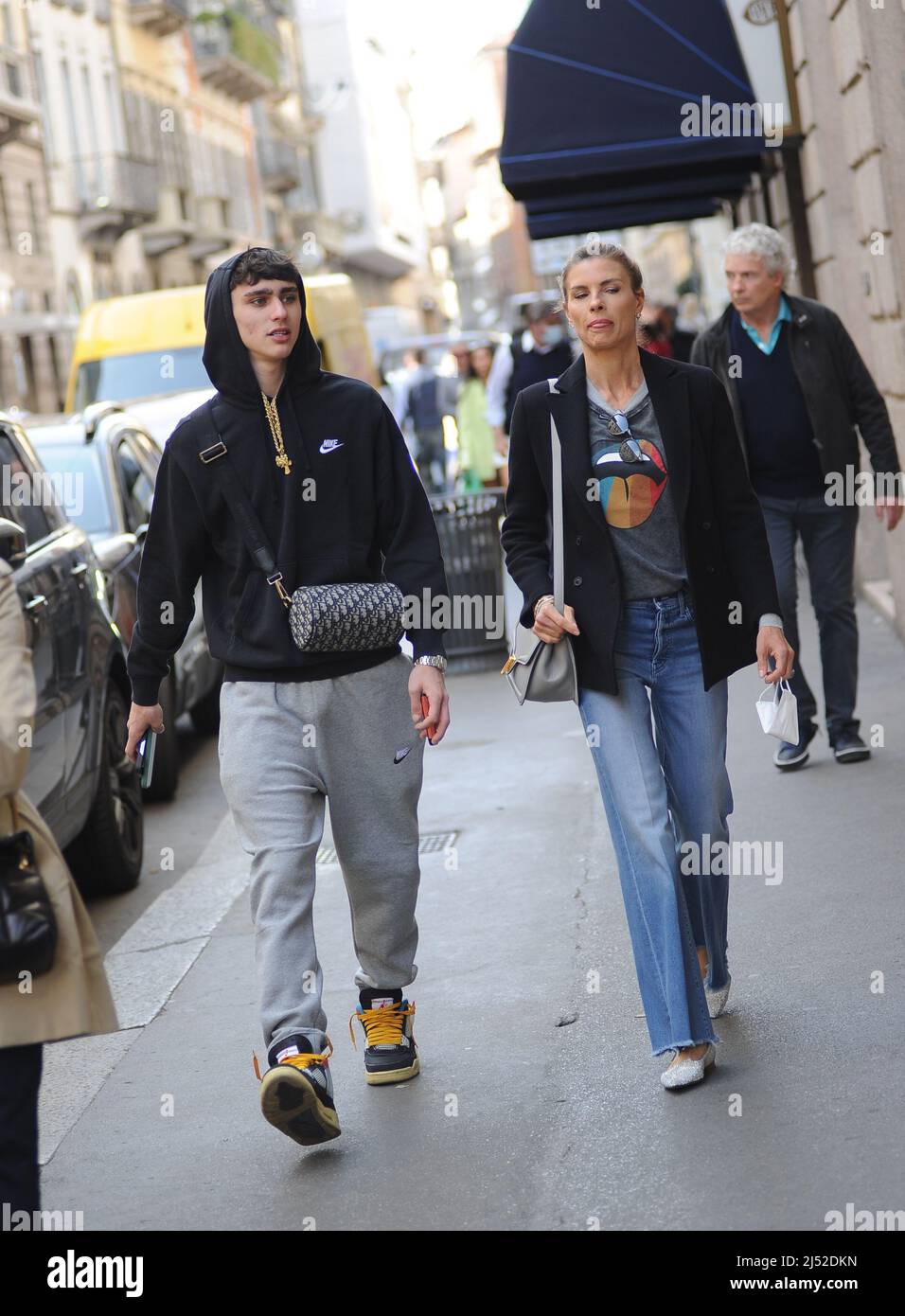 Milan, . 19th Apr, 2022. Milan, 19-04-2022 Martina Colombari, who is on the 'Montagne Russe' theater tour with Corrado Tedeschi, surprised walking through the streets of the center with her son ACHILLE Credit: Independent Photo Agency/Alamy Live News Stock Photo