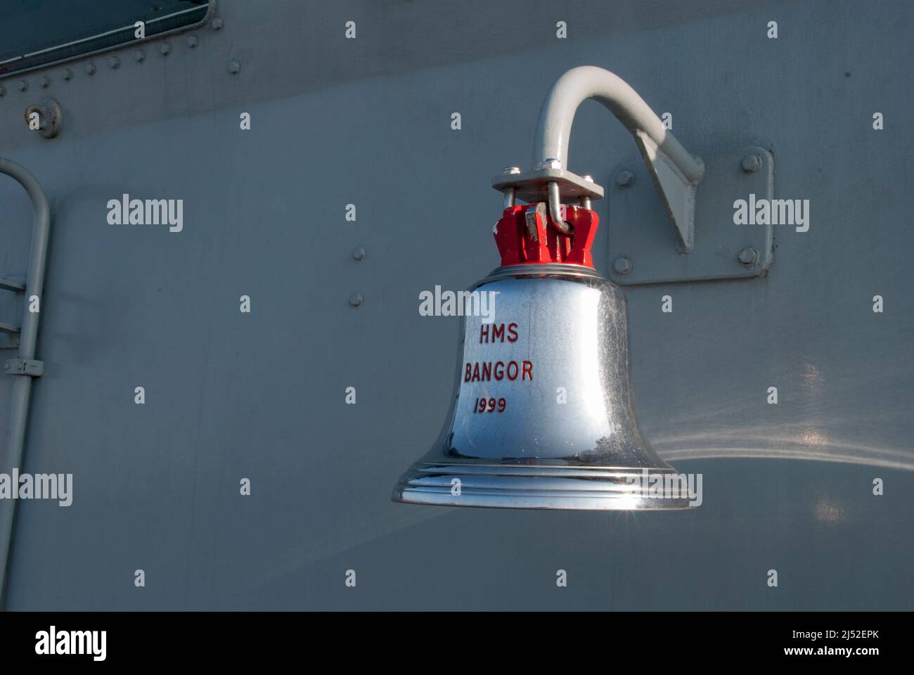 Ship's bell on the Royal Navy minesweeper HMS Bangor Stock Photo