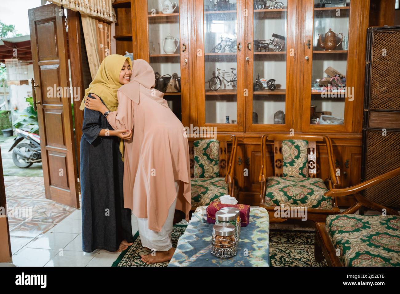 Excited asian muslim family hi-res stock photography and images - Alamy