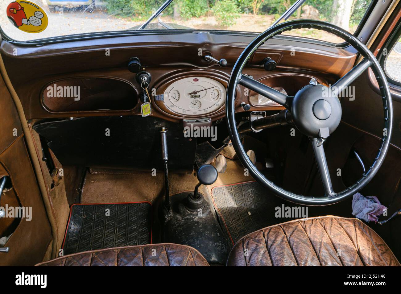 Steering wheel and interior of a 1938 Hillman Minx Stock Photo