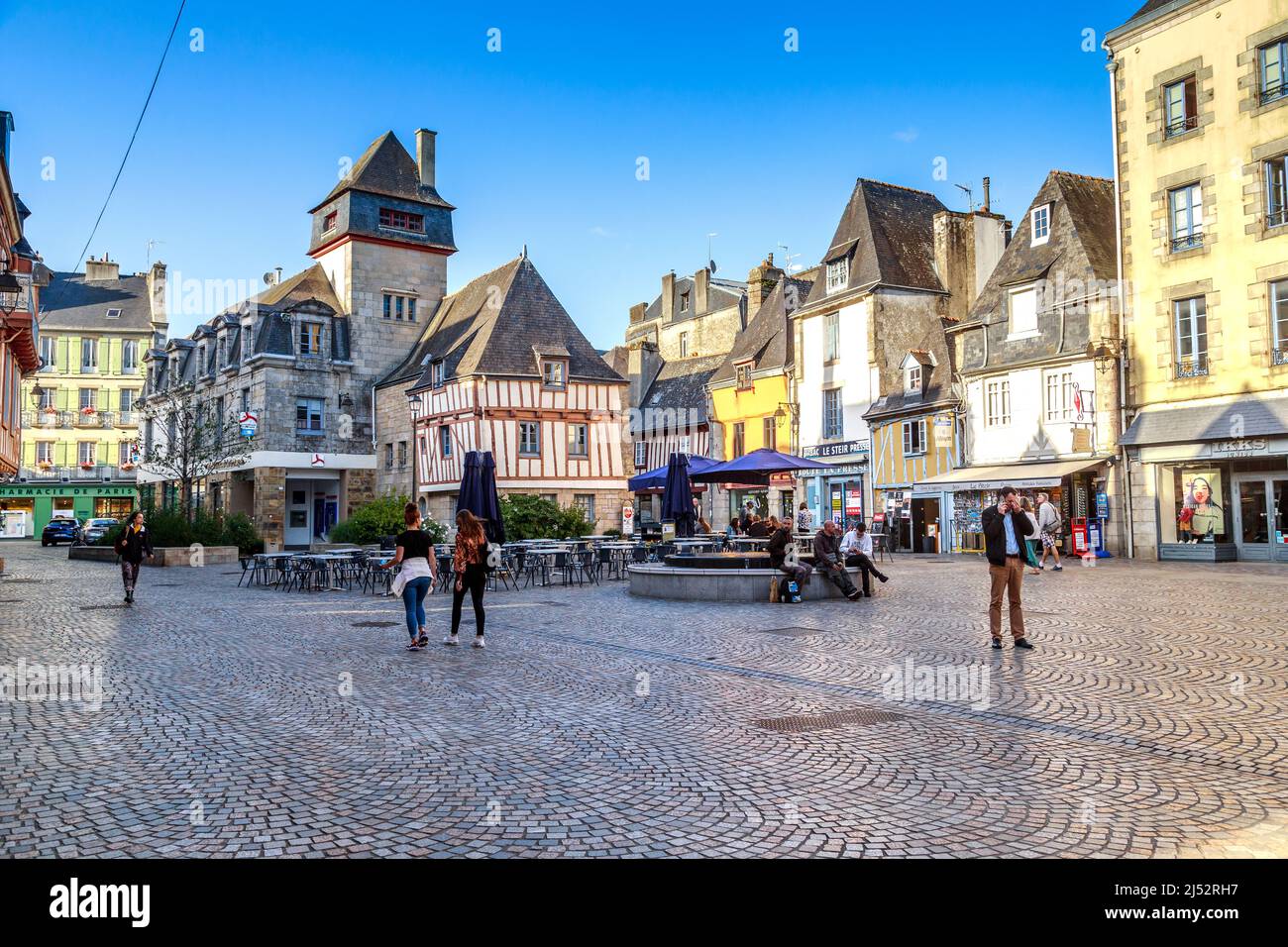 QUIMPER , FRANCE - SEPTEMBER 5, 2019: This is Place Terre au Duc, with half-timbered and stone medieval houses in the evening. Stock Photo