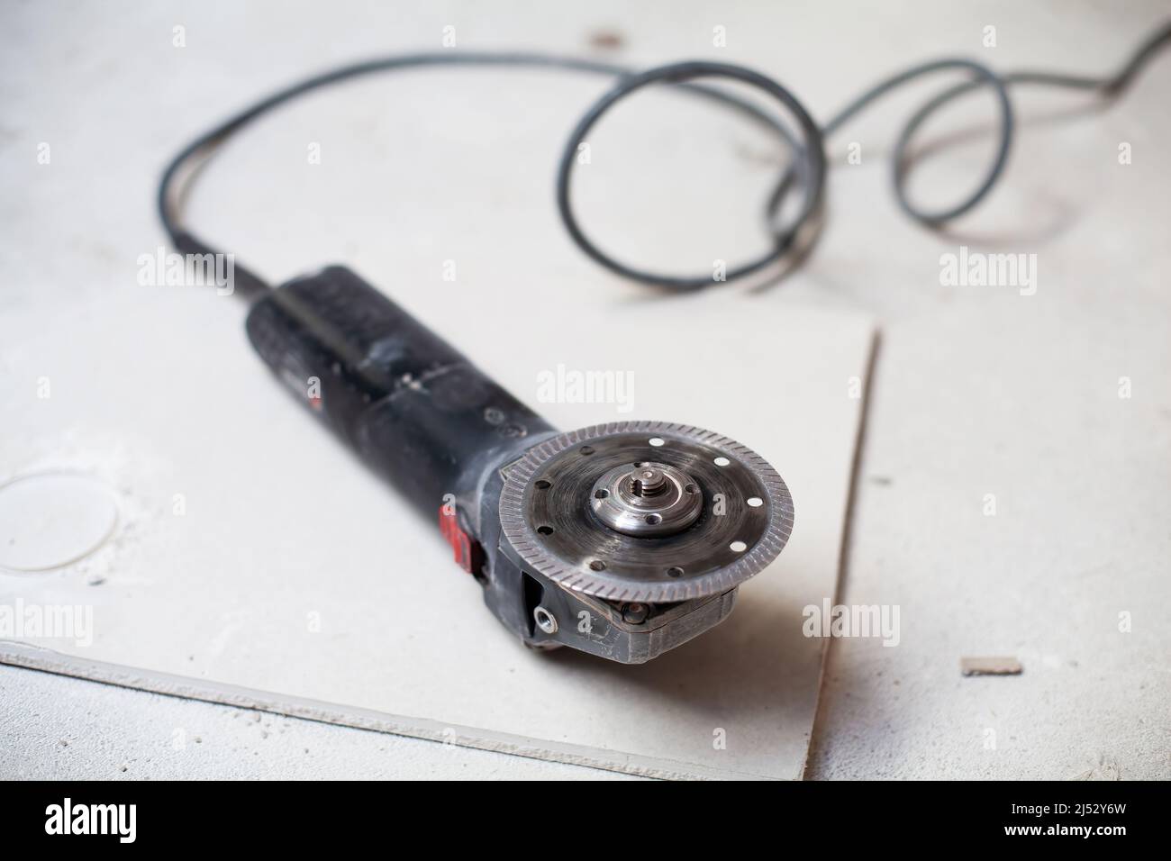 Angle Grinder With Diamond Masonry Blade. electric grinding machine