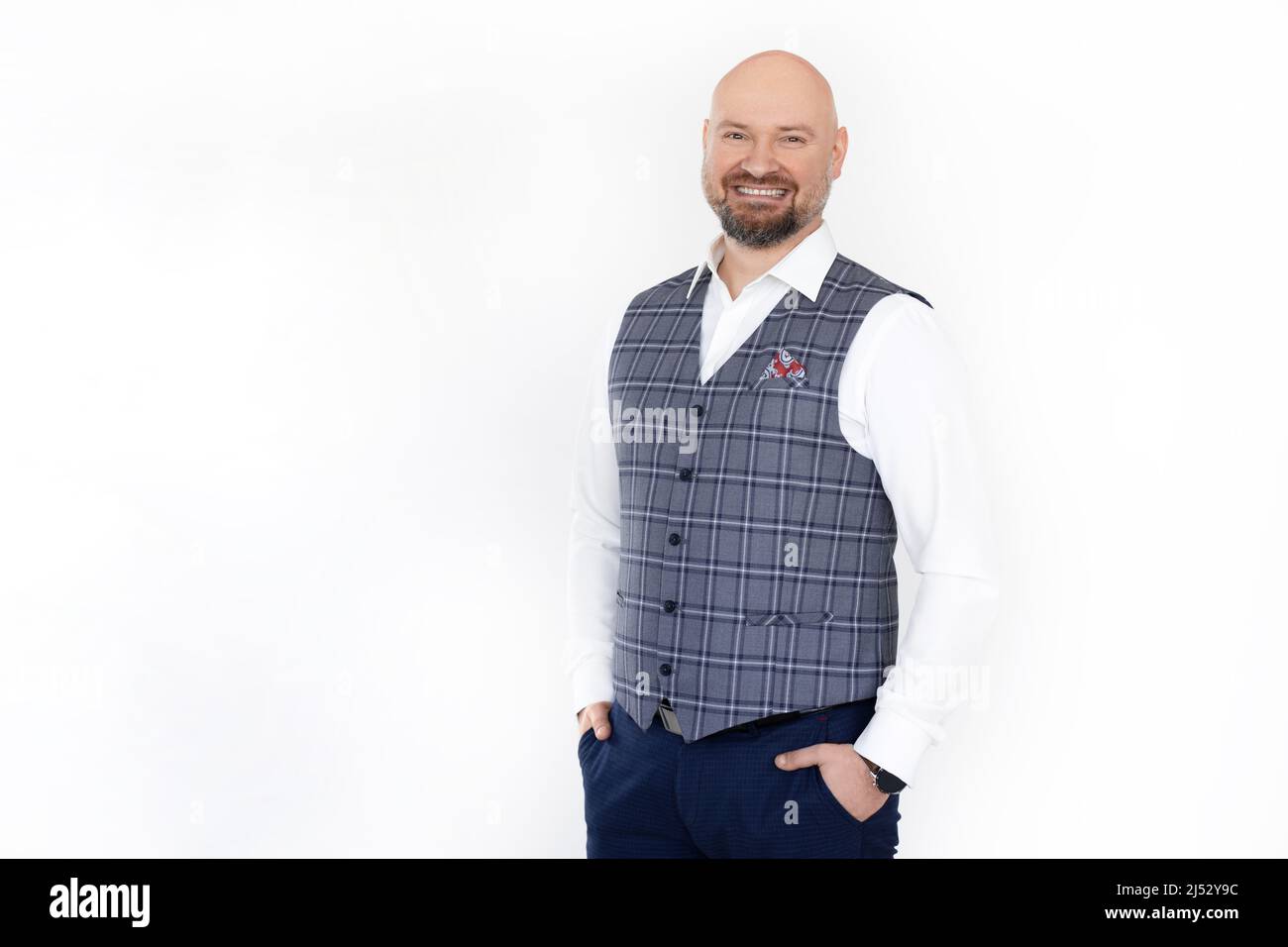 Wearing jeans and vest hi-res stock 