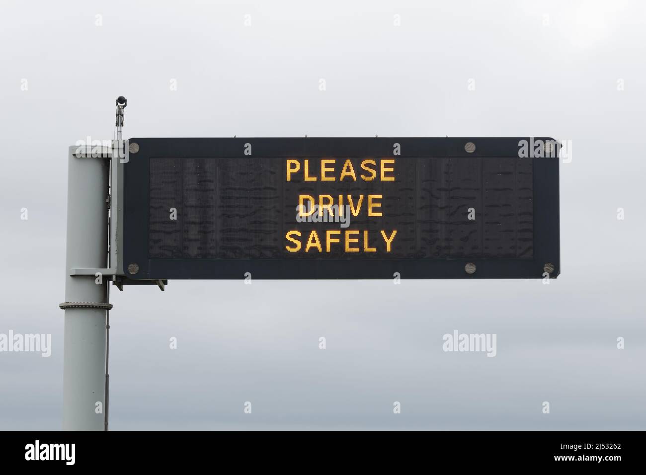 Please Drive Safely motorway overhead gantry variable message sign, Scotland, UK Stock Photo