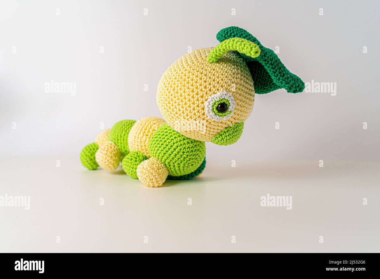 amigurumi caterpillar out of wool bavaria germany Stock Photo