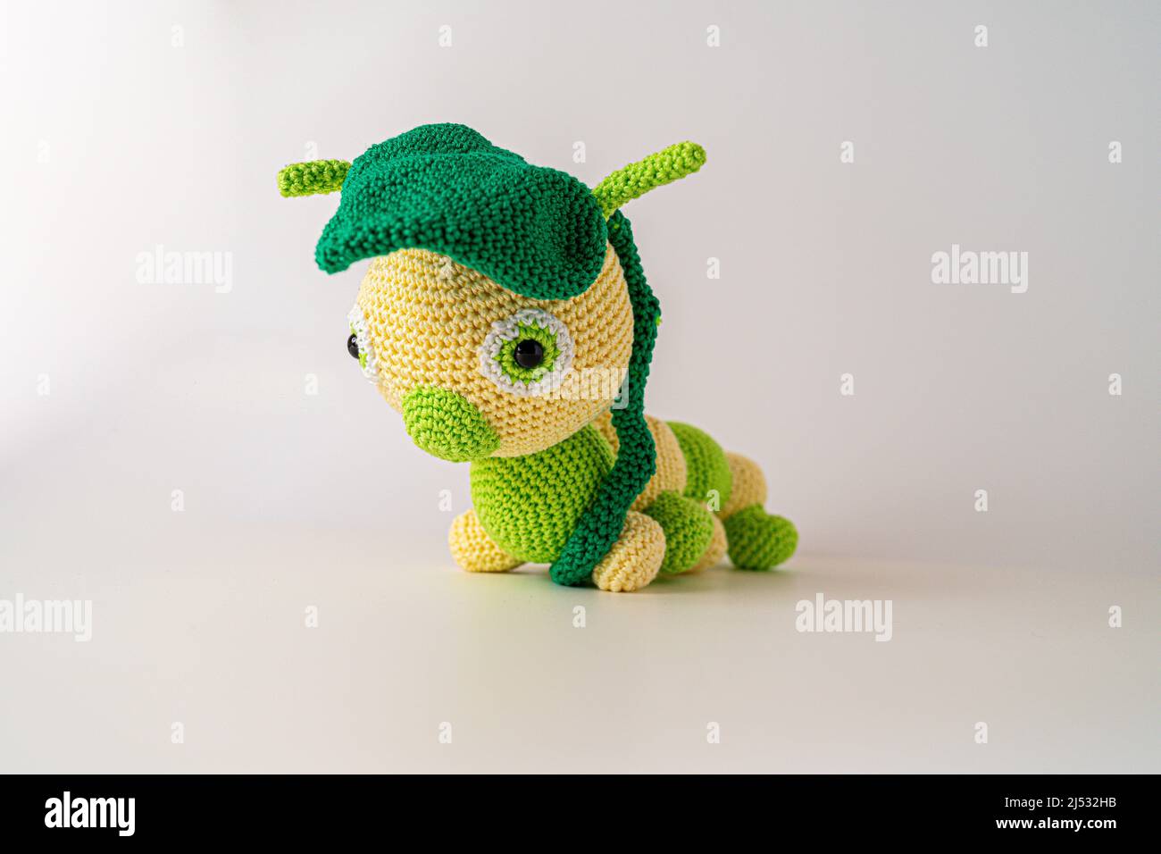 amigurumi caterpillar out of wool bavaria germany Stock Photo