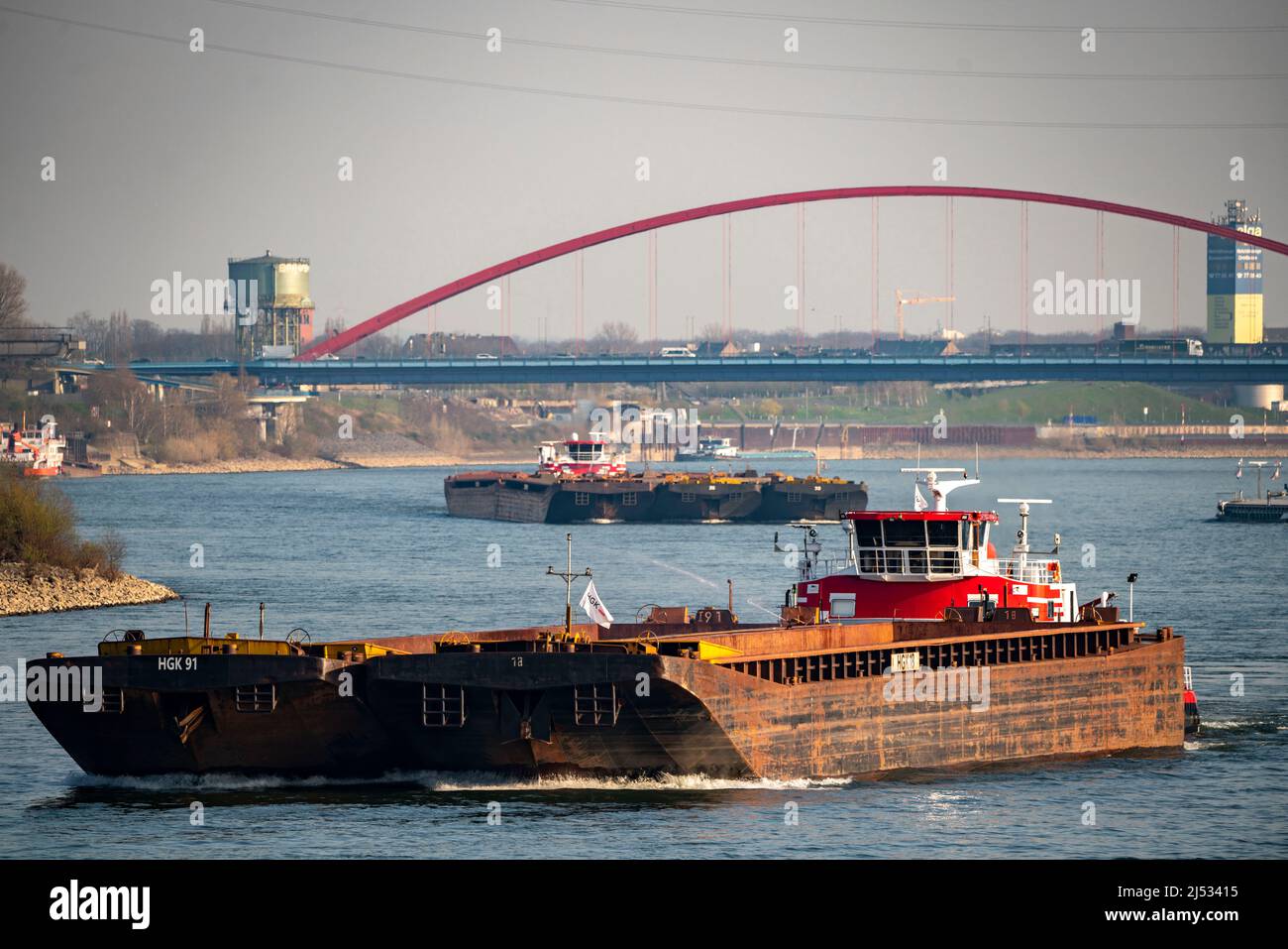 Cargo ships on the Rhine near Duisburg, push boats, HGK, behind the Bridge of Solidarity, Rheinhausen, NRW, Germany, Stock Photo