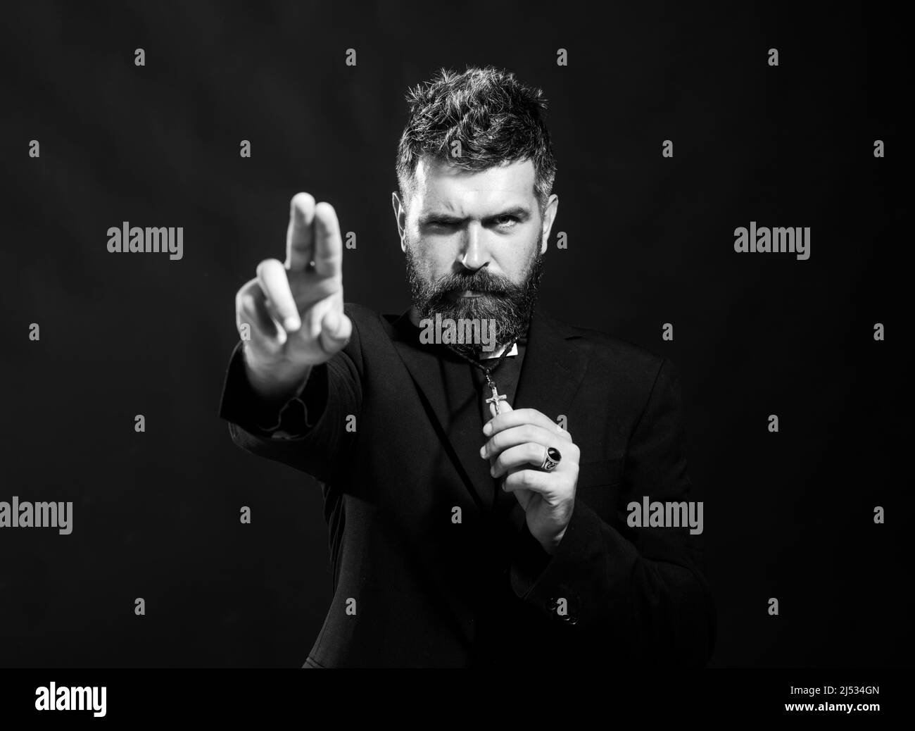Portrait of monk man with pray. Priest praying oblation. Senior