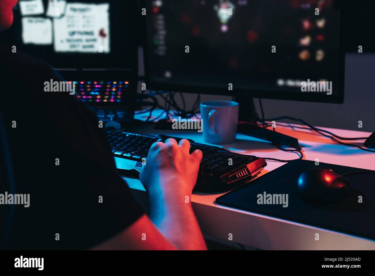 Close-up of the hands of a young online video game professional ...