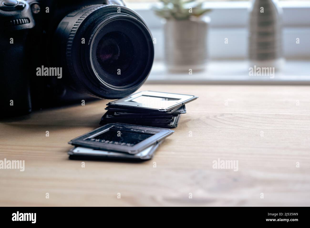 Camera lens and photographic slides for film projector in vintage style