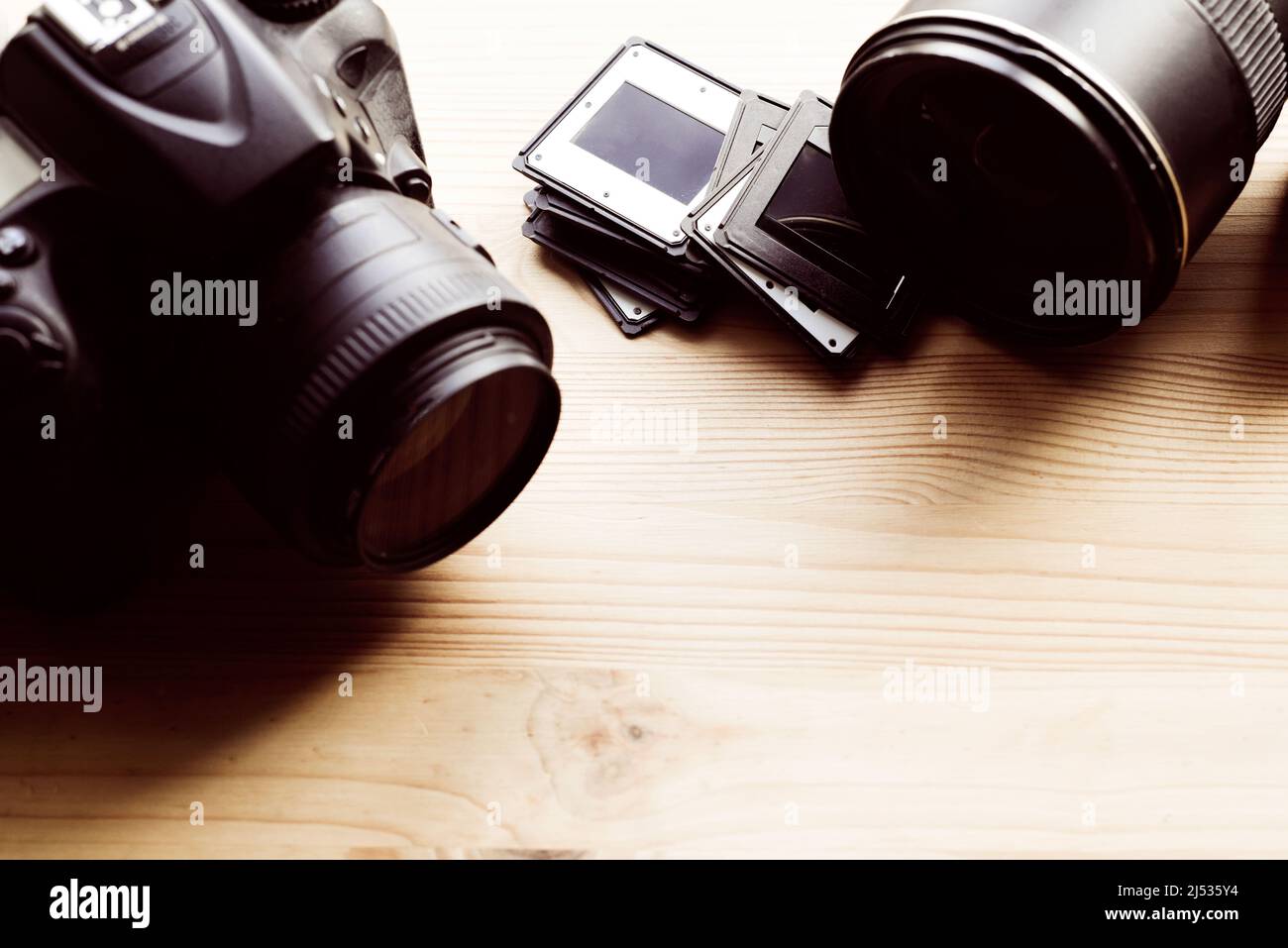 Camera lens and photographic slides for film projector Stock Photo Alamy
