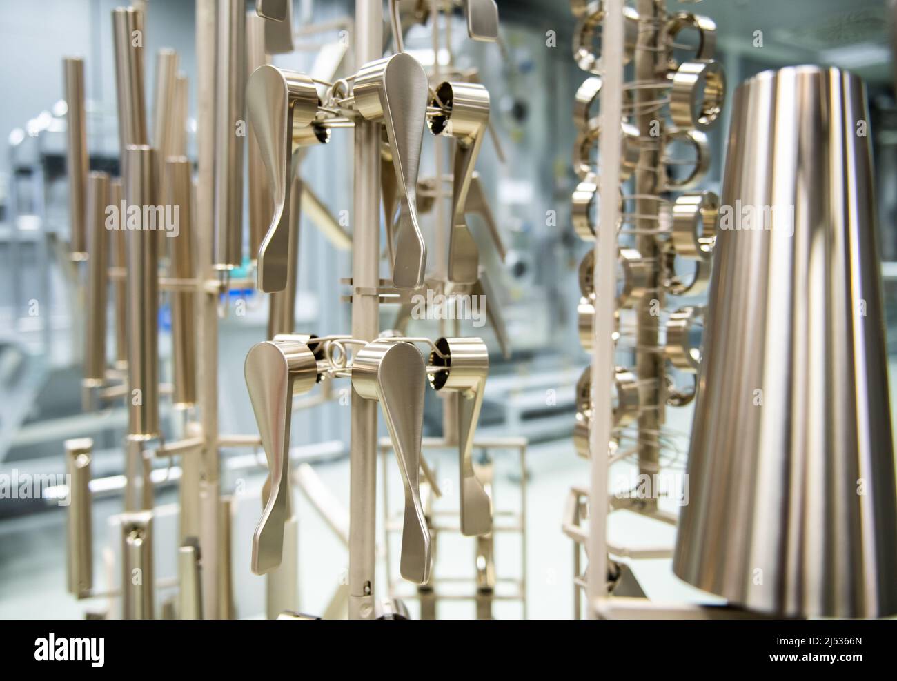 Schiltach, Germany. 11th Apr, 2022. Hansgrohe faucet parts on rack for