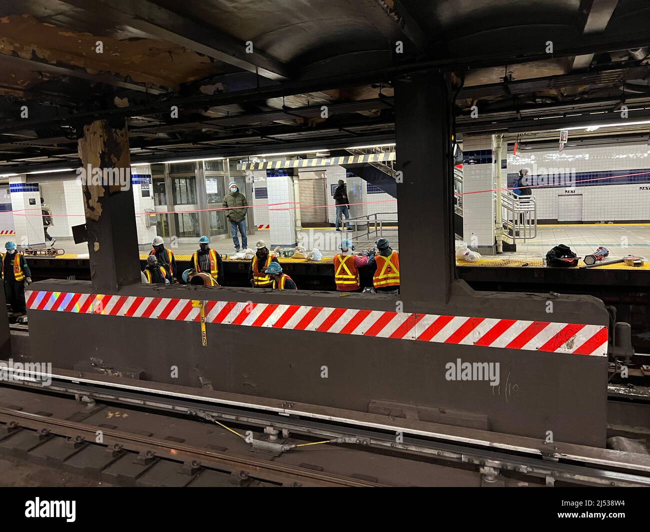 MTA workers replacing track at the Jay Street -Metro Tech subway train station in Brooklyn, New York. Stock Photo