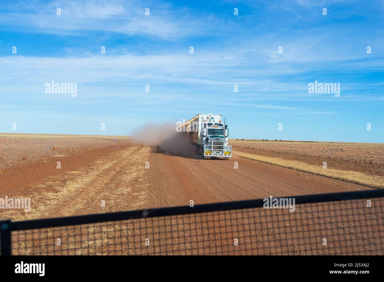 Cattle truck kicking dust on the historic Barkly Stock Route, Barkly Tablelands, Northern Territory, NT, Australia Stock Photo