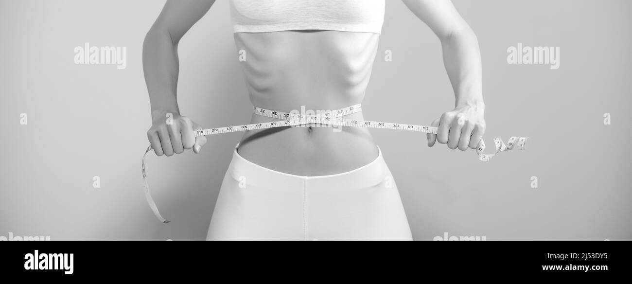 https://c8.alamy.com/comp/2J53DY5/weight-loss-waist-measurement-diet-and-health-concept-woman-measuring-her-waist-2J53DY5.jpg