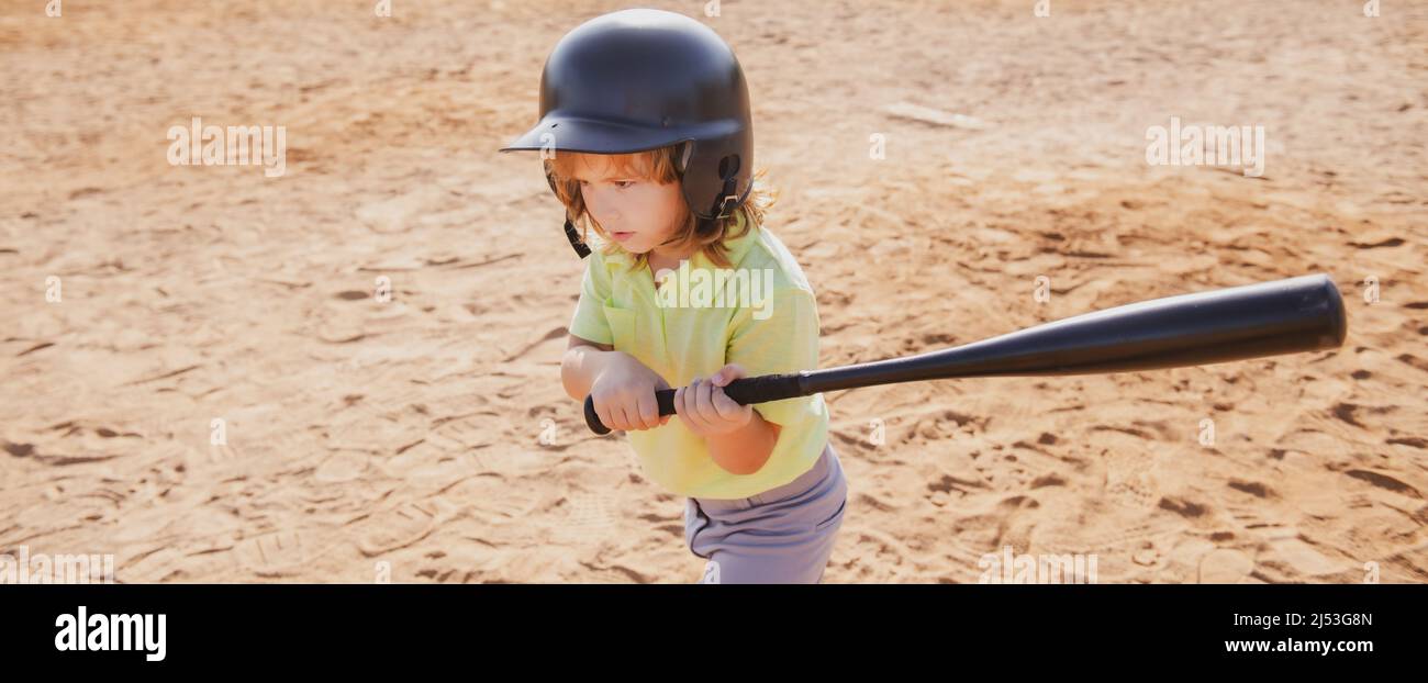 Child baseball player focused ready to bat. Kid holding a baseball bat Stock Photo Alamy