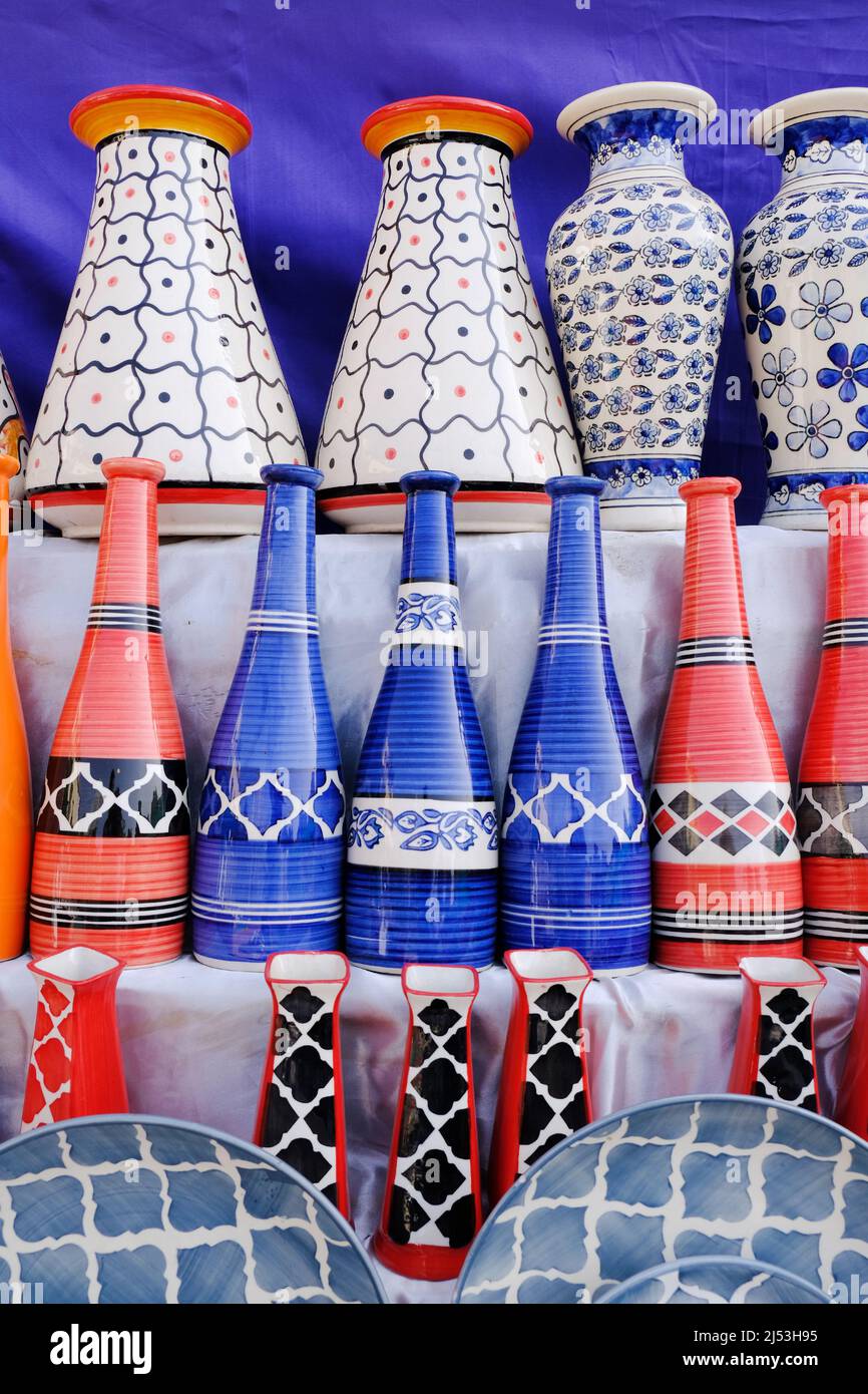 Multicolored Household ceramic items in the Street Market. Stock Photo