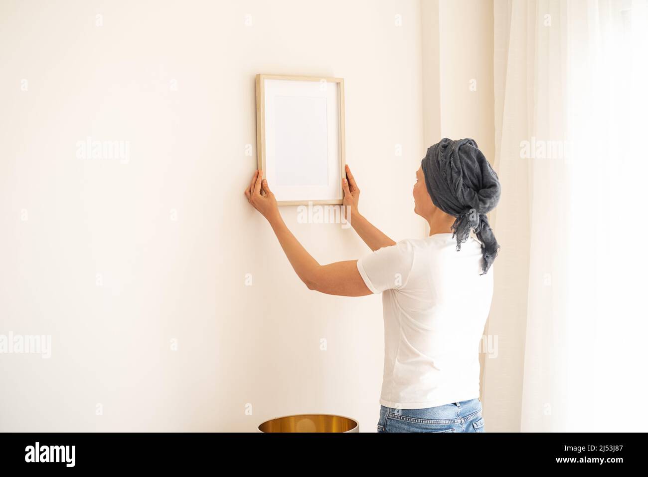 A wooden frame with empty space in women's hands Stock Photo