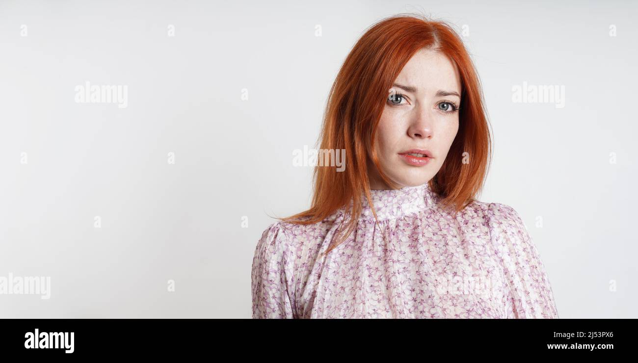 studio portrait of serious mid adult woman with copy space Stock Photo