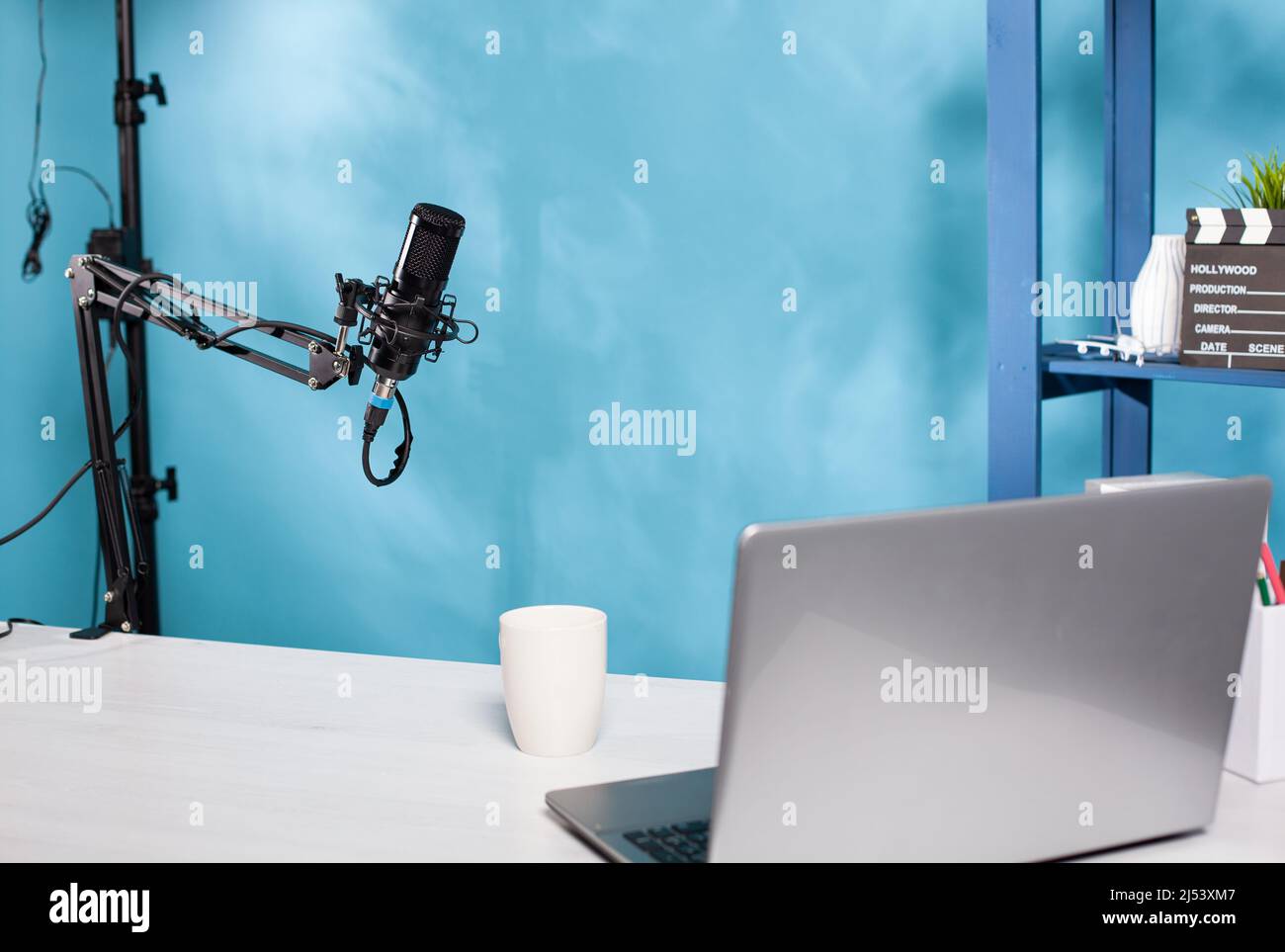 Professional microphone swivel boom arm stand in empty vlog