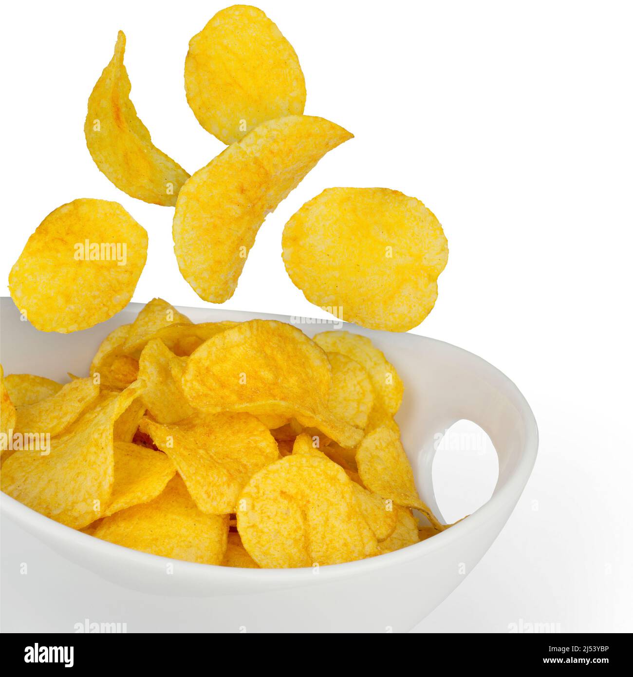 Potato chips falling in a bowl, isolated Stock Photo