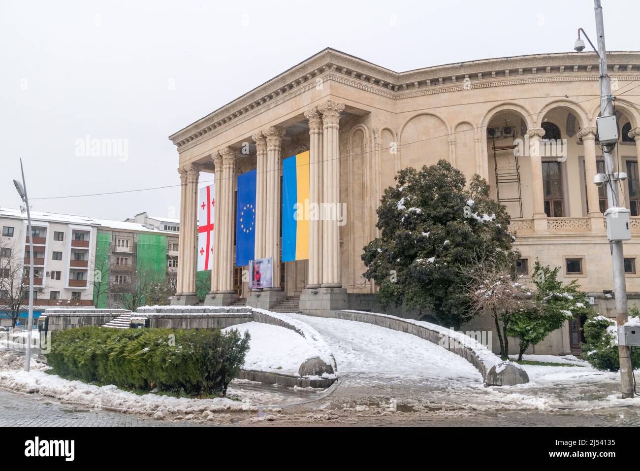 Kutaisi, Georgia - March 17, 2022: Meskhishvili Theatre with Georgian, Europe Union and Ukraine flags. Stock Photo