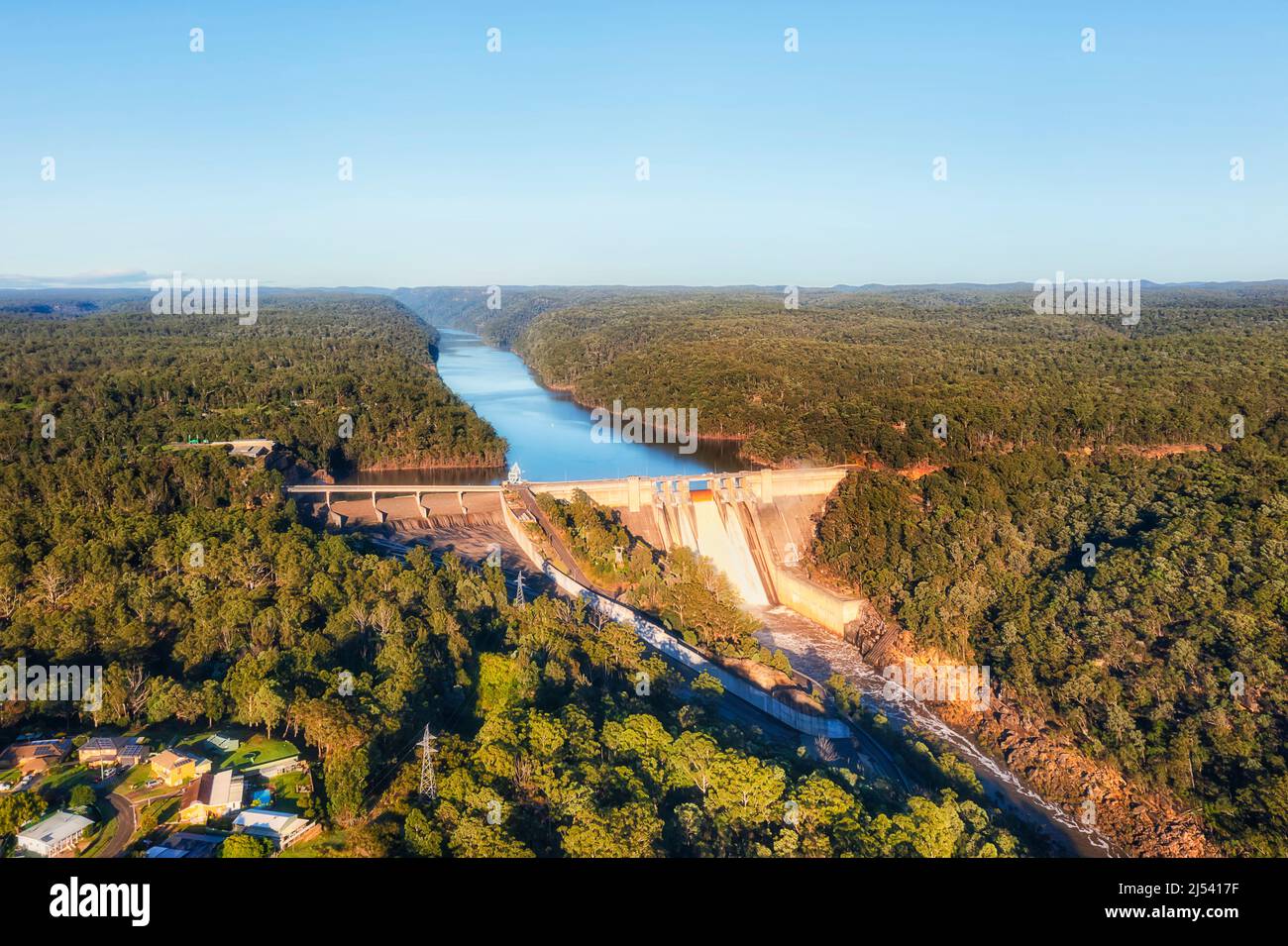 Warragamba river closed by concrete power generation dam in flood