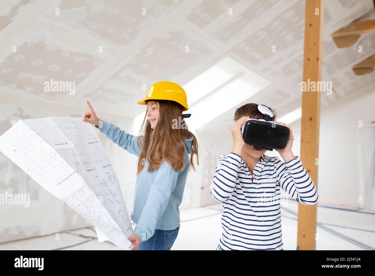 Brother and sister are on the construction site of their new room loft ...