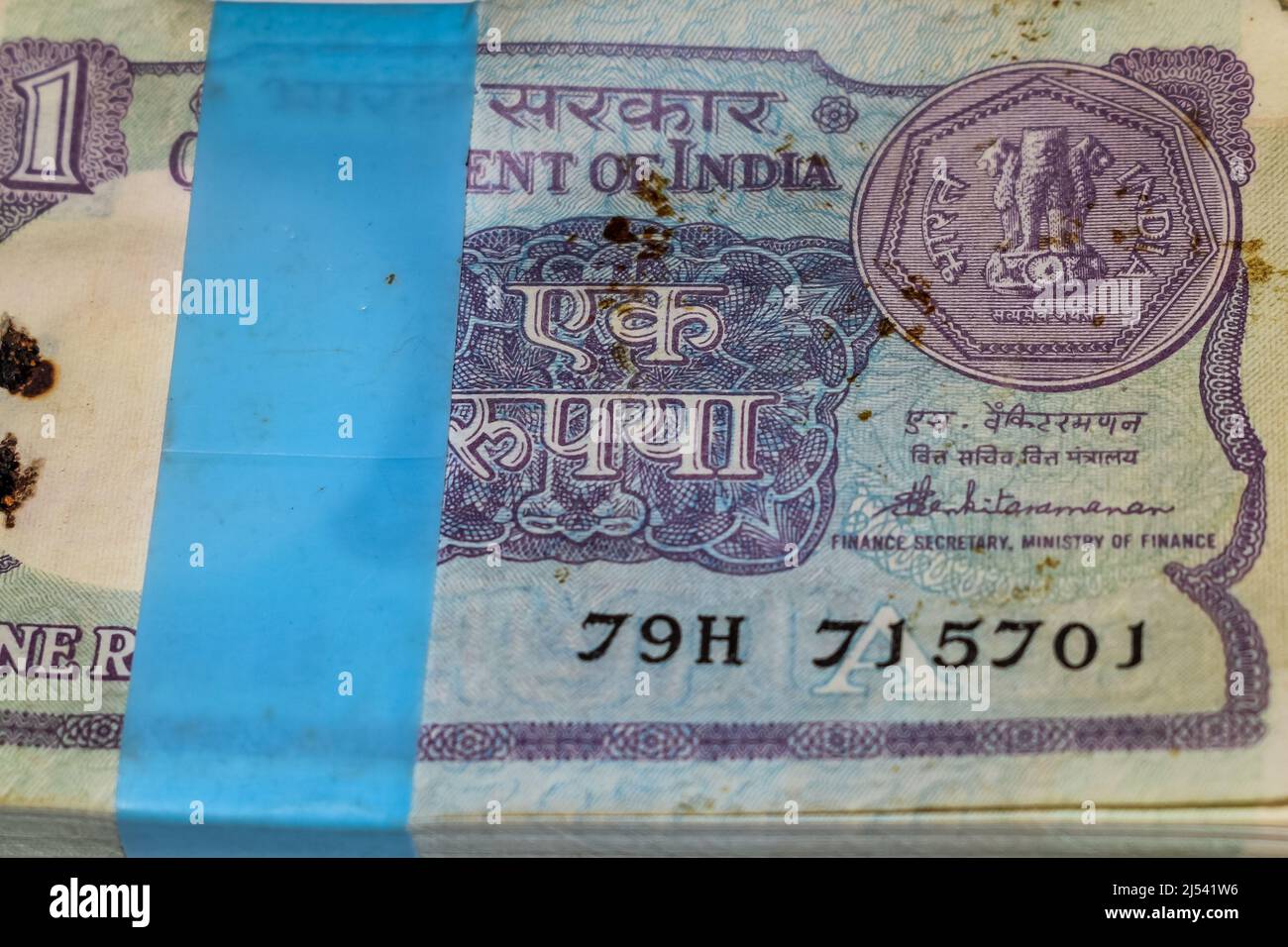 Old One Rupee notes combined on the table, India money on the rotating ...
