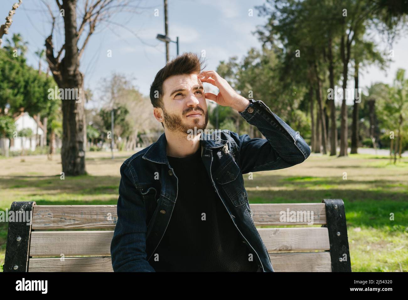 Man hand puts young green hi-res stock photography and images - Alamy